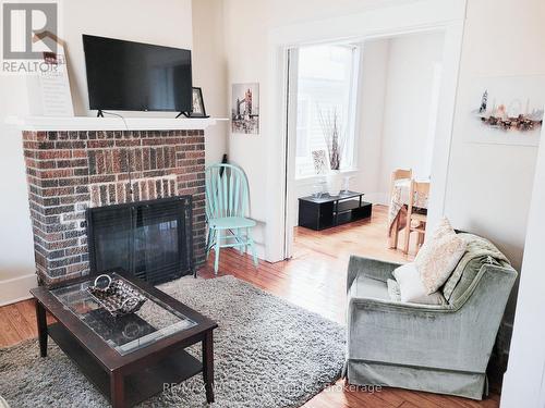 52 Becher Street, London, ON - Indoor Photo Showing Living Room With Fireplace