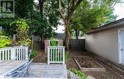 View of yard featuring a wooden deck - 