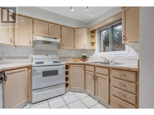 1006 King Street Unit# 107, Penticton, BC - Indoor Photo Showing Kitchen With Double Sink