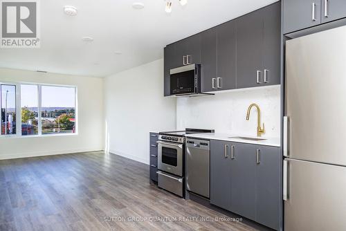 207 - 8010 Derry Road, Milton, ON - Indoor Photo Showing Kitchen With Stainless Steel Kitchen