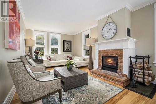 6 Spring Street N, Westport, ON - Indoor Photo Showing Living Room With Fireplace