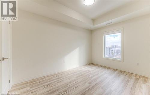 Empty room featuring light hardwood / wood-style flooring - 301 Westmount Road W Unit# 204, Kitchener, ON - Indoor Photo Showing Other Room