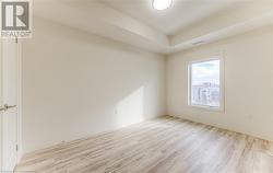 Empty room featuring light hardwood / wood-style flooring - 