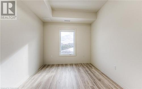 Spare room with light hardwood / wood-style floors - 301 Westmount Road W Unit# 204, Kitchener, ON - Indoor Photo Showing Other Room