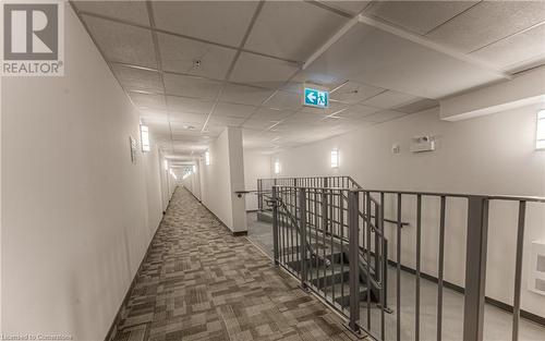 Hallway featuring a paneled ceiling and carpet - 301 Westmount Road W Unit# 204, Kitchener, ON - Indoor Photo Showing Other Room