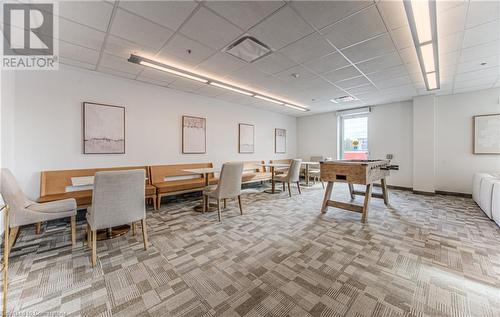 Carpeted dining area with a paneled ceiling - 301 Westmount Road W Unit# 204, Kitchener, ON - Indoor