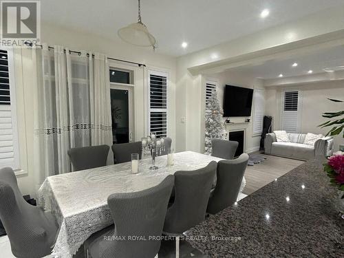 22 Hassard-Short Lane, Ajax, ON - Indoor Photo Showing Dining Room With Fireplace