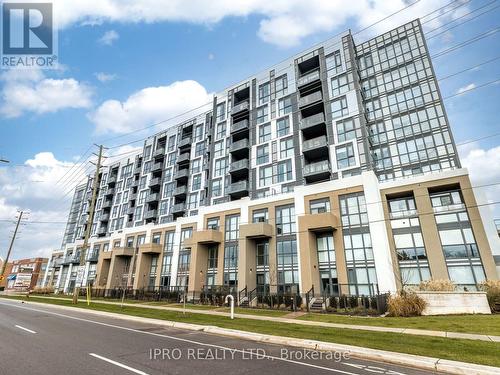 721 - 509 Dundas Street W, Oakville, ON - Outdoor With Facade