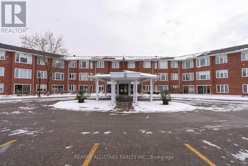 208 - 2 Heritage Way, Kawartha Lakes, ON - Outdoor With Facade