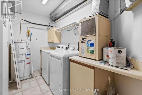 208 - 2 Heritage Way, Kawartha Lakes, ON - Indoor Photo Showing Laundry Room