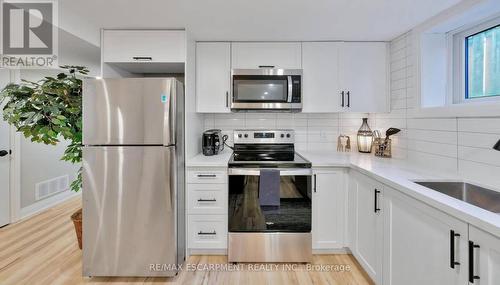 Lower - 5 Sunning Hill Avenue, Hamilton, ON - Indoor Photo Showing Kitchen With Upgraded Kitchen