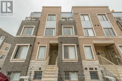 292 - 140 Honeycrisp Crescent, Vaughan, ON -  With Facade