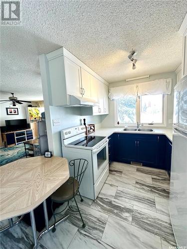 205 1St Street W, Spiritwood, SK - Indoor Photo Showing Kitchen With Double Sink