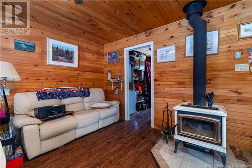 40 Whittaker Lane, Long Reach, NB - Indoor Photo Showing Living Room With Fireplace