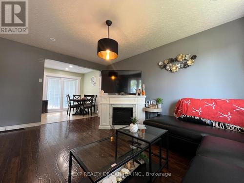 206 Ottolen Street, Timmins, ON - Indoor Photo Showing Other Room With Fireplace