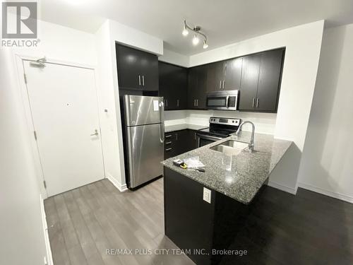 1119 - 15 James Finlay Way, Toronto, ON - Indoor Photo Showing Kitchen With Stainless Steel Kitchen With Double Sink With Upgraded Kitchen