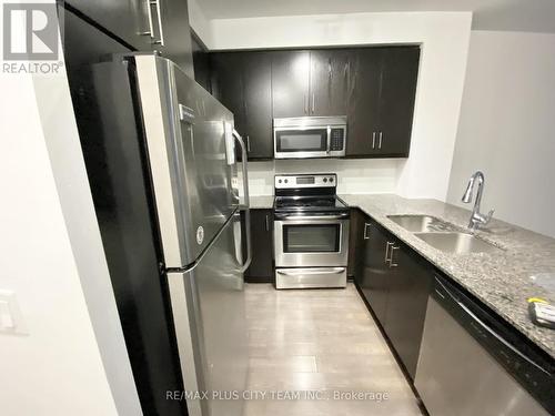 1119 - 15 James Finlay Way, Toronto, ON - Indoor Photo Showing Kitchen With Stainless Steel Kitchen With Double Sink