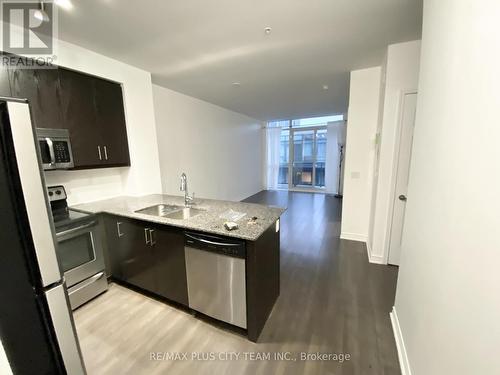 1119 - 15 James Finlay Way, Toronto, ON - Indoor Photo Showing Kitchen With Stainless Steel Kitchen With Double Sink