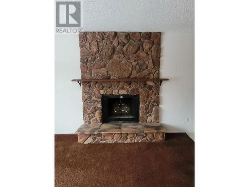 8109 Princeton Crescent, Prince George, BC - Indoor Photo Showing Living Room With Fireplace