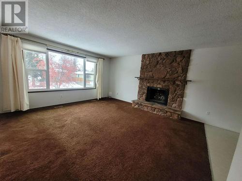 8109 Princeton Crescent, Prince George, BC - Indoor Photo Showing Living Room With Fireplace