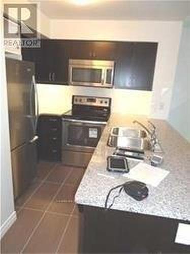 920 - 25 Lower Simcoe Street, Toronto, ON - Indoor Photo Showing Kitchen With Stainless Steel Kitchen With Double Sink With Upgraded Kitchen