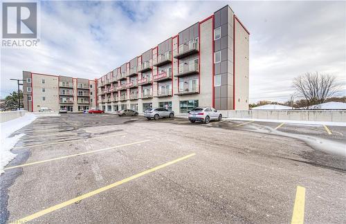 View of building exterior - 301 Westmount Road W Unit# G1, Kitchener, ON - Outdoor With Facade