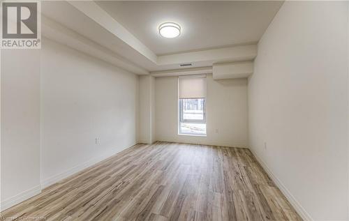 Spare room featuring light hardwood / wood-style floors - 301 Westmount Road W Unit# G1, Kitchener, ON - Indoor Photo Showing Other Room