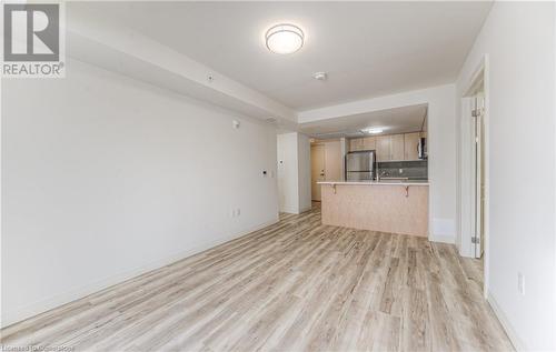 Unfurnished living room with light hardwood / wood-style flooring - 301 Westmount Road W Unit# G1, Kitchener, ON - Indoor