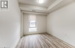 Spare room with light hardwood / wood-style flooring - 