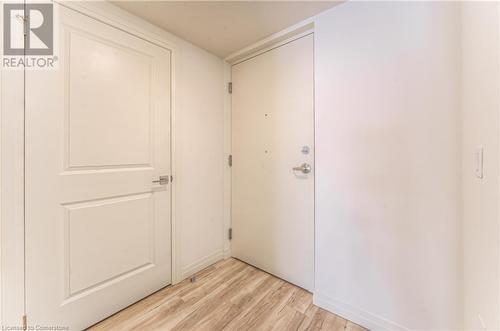 Corridor with light hardwood / wood-style flooring - 301 Westmount Road W Unit# G1, Kitchener, ON - Indoor Photo Showing Other Room