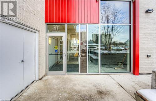 View of exterior entry with a patio - 301 Westmount Road W Unit# G1, Kitchener, ON -  With Exterior