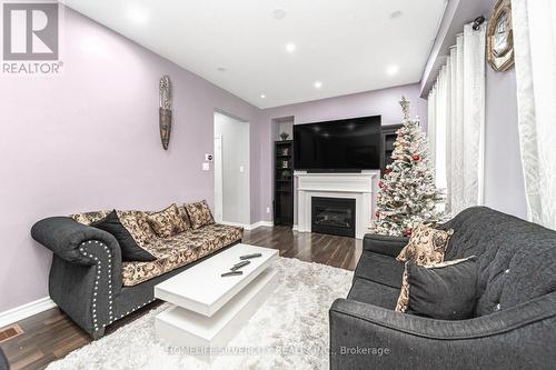 9 Magdalene Crescent, Brampton, ON - Indoor Photo Showing Living Room With Fireplace