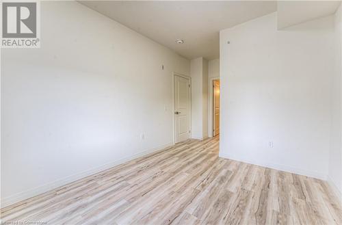 Spare room with light wood-type flooring - 301 Westmount Road W Unit# 414, Kitchener, ON - Indoor Photo Showing Other Room