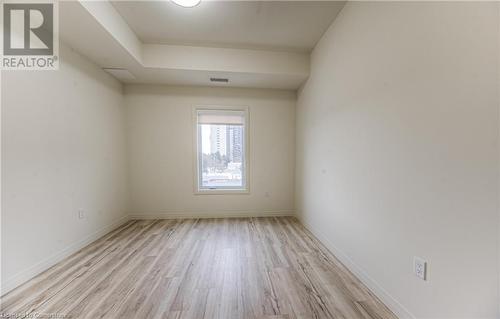 Unfurnished room with light hardwood / wood-style flooring - 301 Westmount Road W Unit# 414, Kitchener, ON - Indoor Photo Showing Other Room