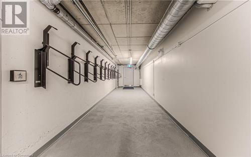 Hall with concrete floors - 301 Westmount Road W Unit# 414, Kitchener, ON - Indoor Photo Showing Other Room