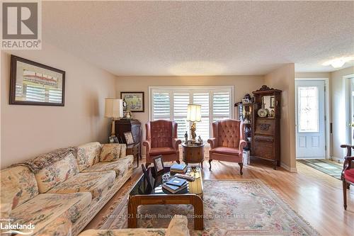 56 Tecumseth Pines Drive, New Tecumseth, ON - Indoor Photo Showing Living Room