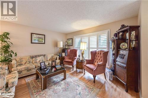 56 Tecumseth Pines Drive, New Tecumseth, ON - Indoor Photo Showing Living Room