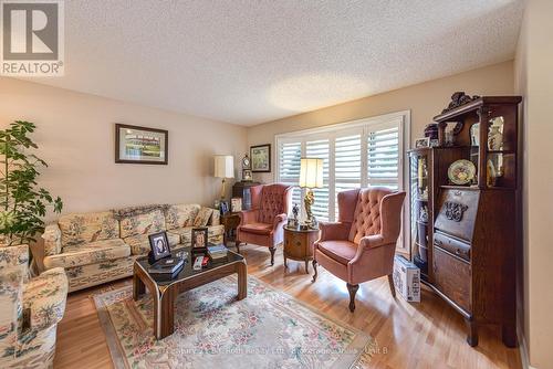 56 Tecumseth Pines Drive, New Tecumseth, ON - Indoor Photo Showing Living Room