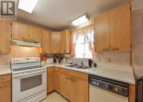 56 Tecumseth Pines Drive, New Tecumseth, ON - Indoor Photo Showing Kitchen With Double Sink