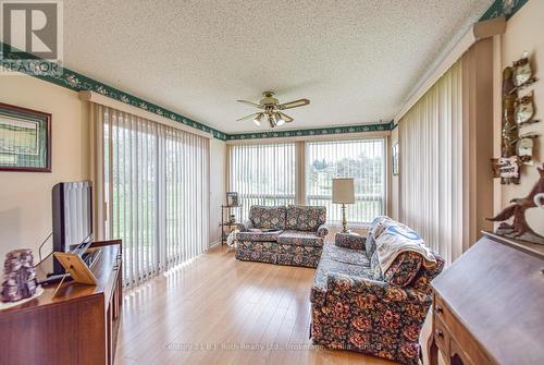 56 Tecumseth Pines Drive, New Tecumseth, ON - Indoor Photo Showing Living Room