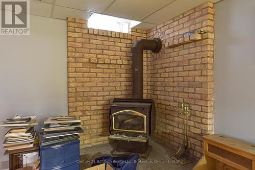 56 Tecumseth Pines Drive, New Tecumseth, ON - Indoor Photo Showing Other Room With Fireplace