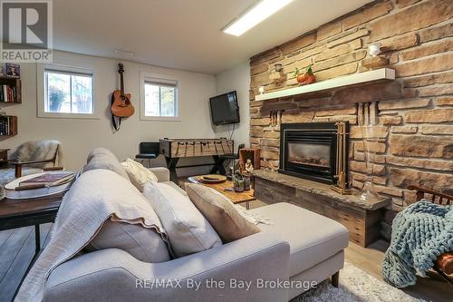 109 Knox Road W, Wasaga Beach, ON - Indoor Photo Showing Living Room With Fireplace