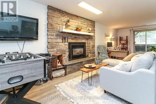 109 Knox Road W, Wasaga Beach, ON - Indoor Photo Showing Living Room With Fireplace