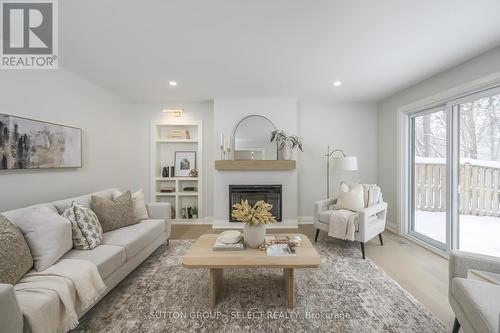 63 Doncaster Avenue, London, ON - Indoor Photo Showing Living Room With Fireplace