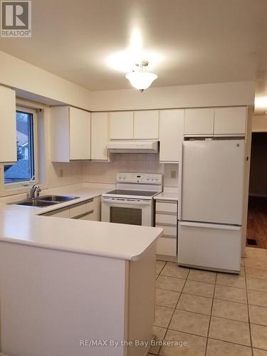 9 Myrtle Lynn Place, Wasaga Beach, ON - Indoor Photo Showing Kitchen With Double Sink