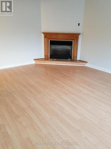 9 Myrtle Lynn Place, Wasaga Beach, ON - Indoor Photo Showing Living Room With Fireplace