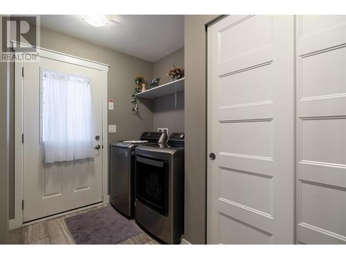 Laundry room, back door - 9510 97 Highway N Unit# 157, Vernon, BC 