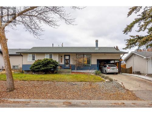 Main home at the front of the lot - 1400-1404 Braemar Street, Kelowna, BC - Outdoor With Facade