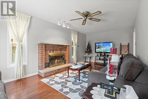 18 Intrepid Drive, Whitby, ON - Indoor Photo Showing Living Room With Fireplace