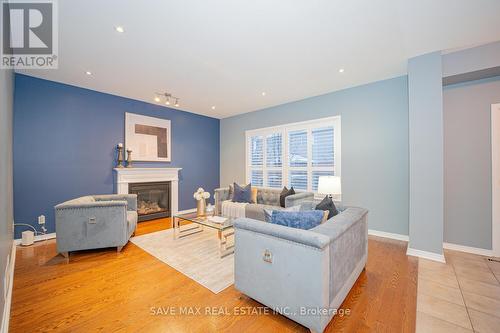 319 Robert Ferrie Drive, Kitchener, ON - Indoor Photo Showing Living Room With Fireplace